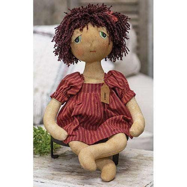 Jessica Doll wears a vintage red dress with gold stripes - The Fox Decor